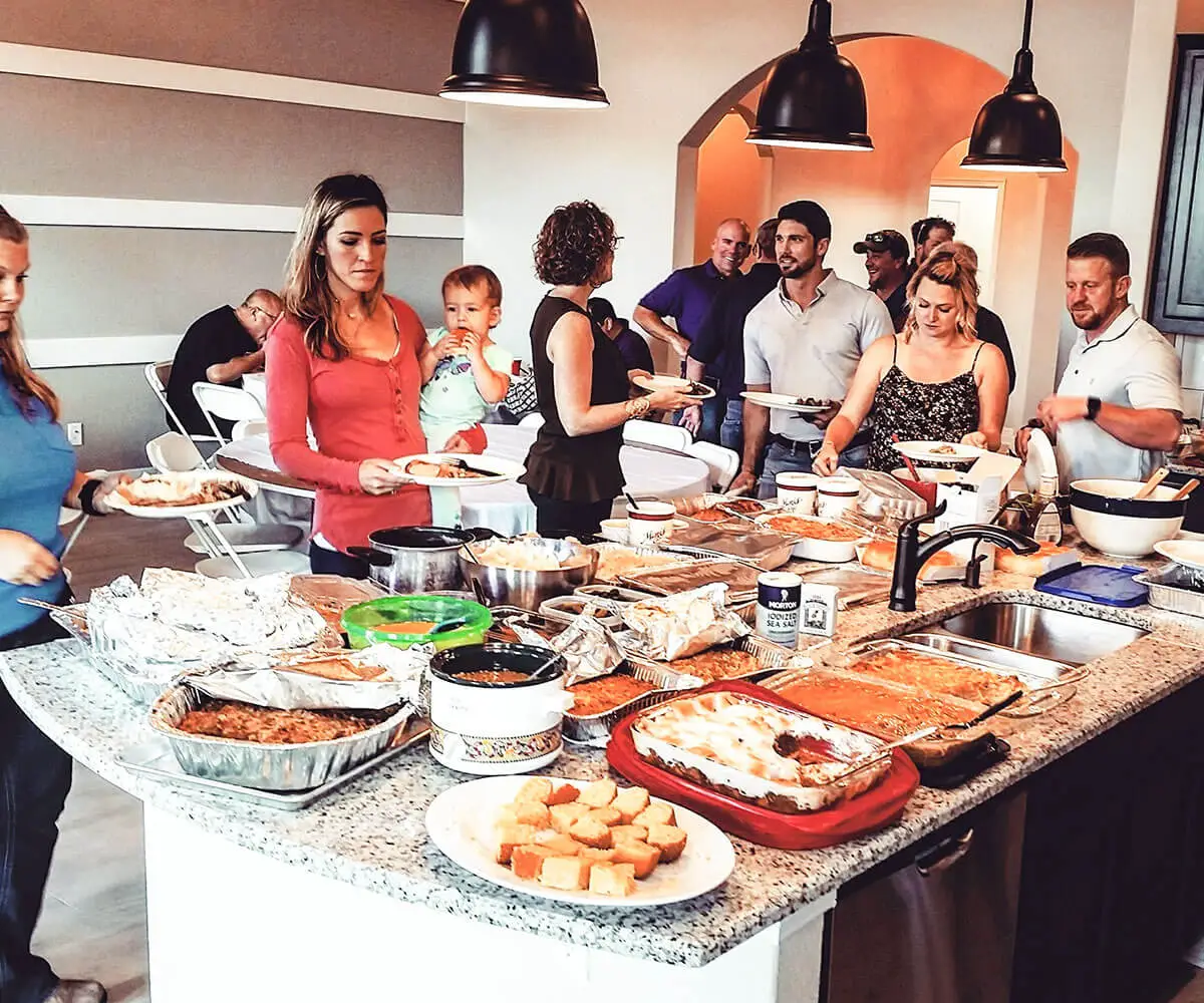 Chemar employees enjoying a buffet lunch