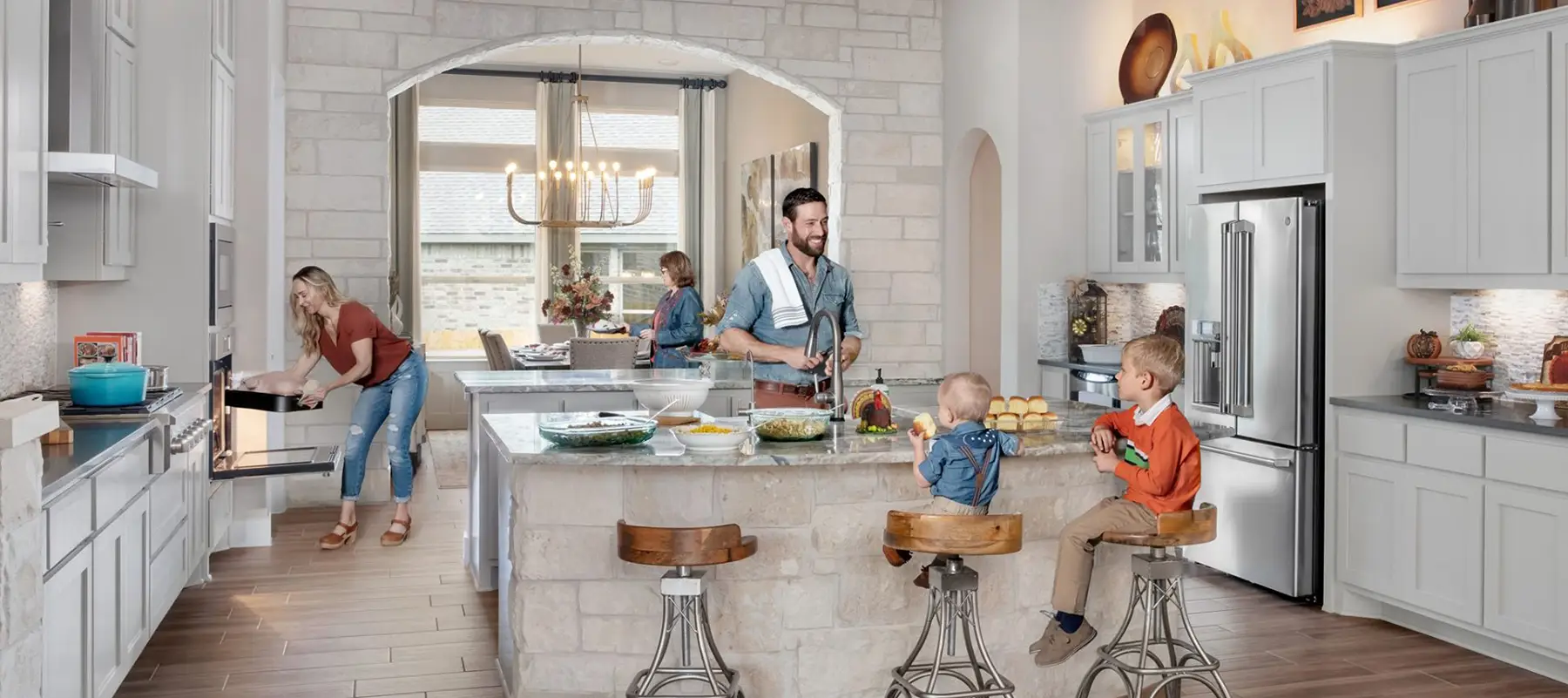 Family cooking in kitchen